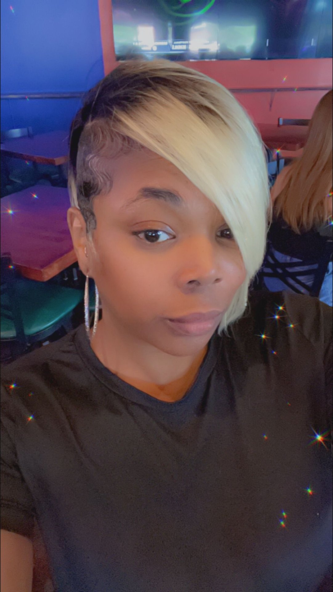Blonde pixie with dark roots and finger wave undercut Frisco