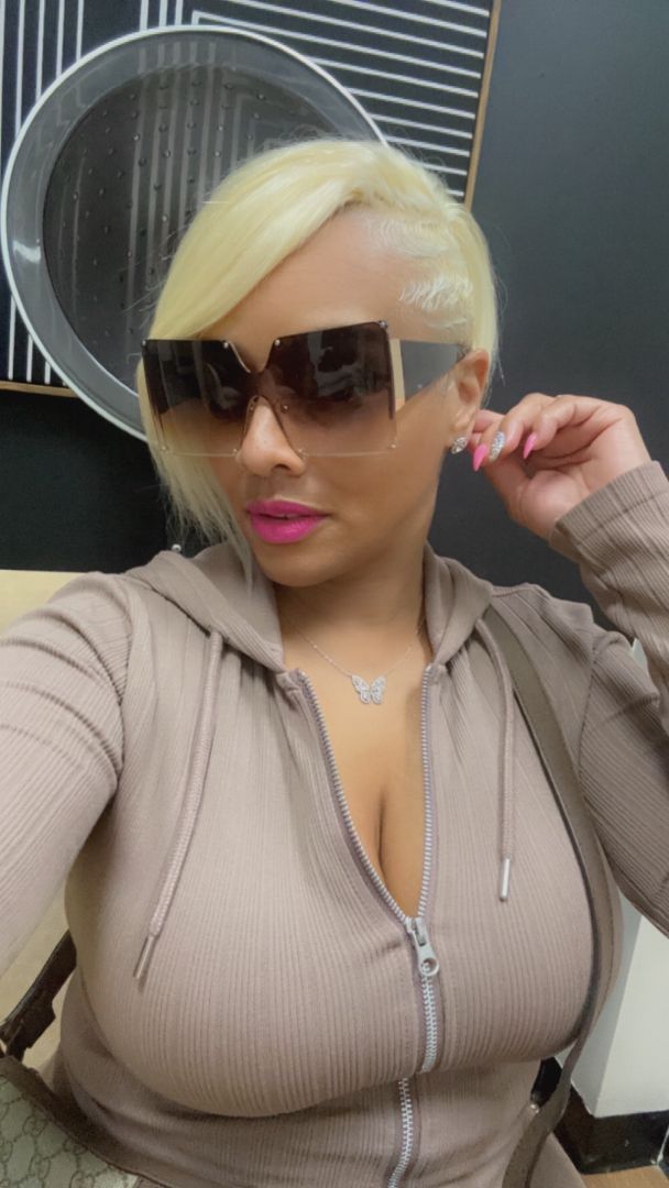 Platinum blonde asymmetrical pixie style Frisco hairstylist