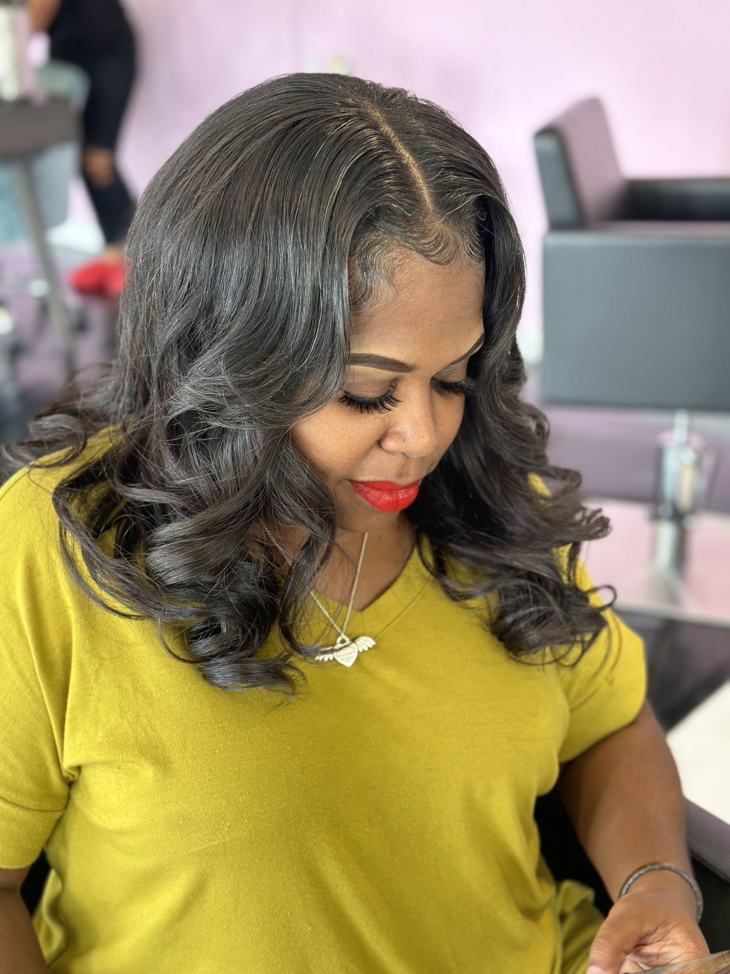 Silk press with bouncy curls and side part Frisco TX